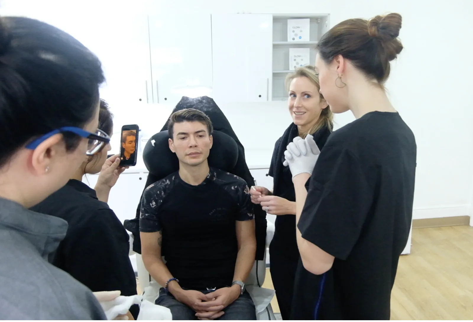 Cosmedocs doctors teaching aesthetic medicine fellows — live patient case study, Harley Street Institute