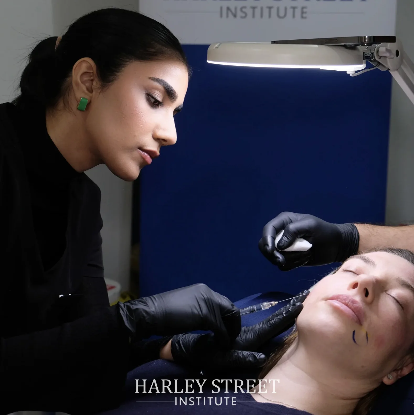 Dermal filler procedure under clinical lighting