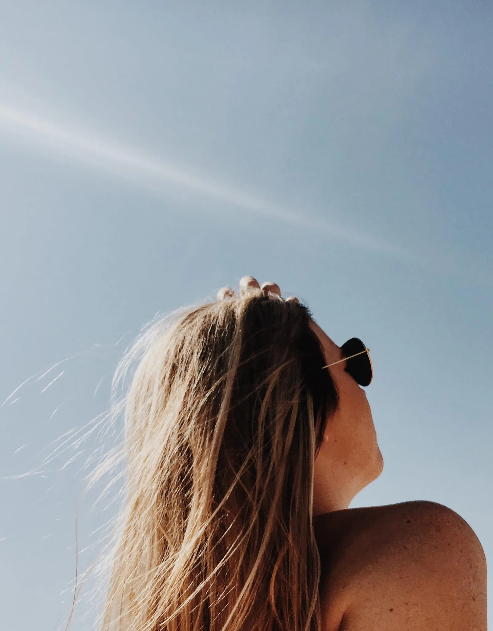 Person enjoying sunshine outdoors for vitamin D and bruise healing
