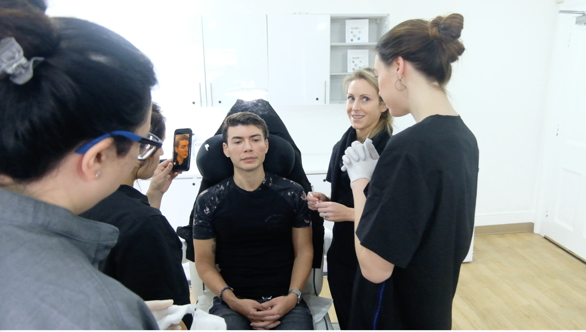 Cosmedocs doctors teaching aesthetic medicine fellows — live patient case study, Harley Street Institute