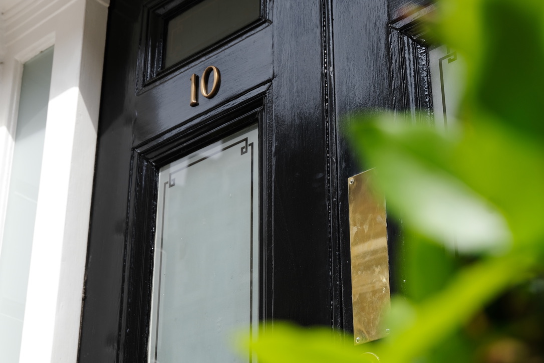 Professional entrance to Cosmedocs Harley Street clinic with elegant door number 10