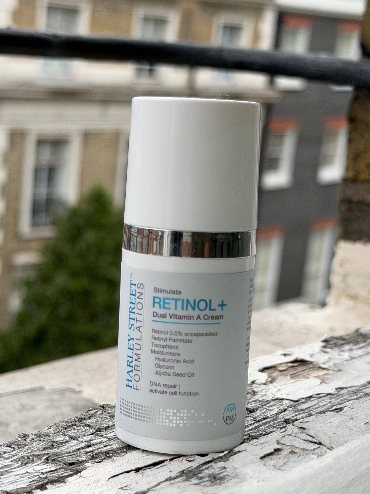 Retinol+ Dual Vitamin A Cream by Harley Street Formulations photographed on a London balcony