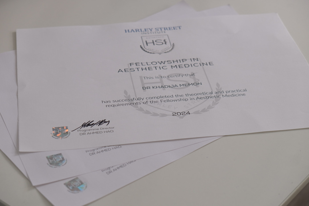 Fellowship in Aesthetic Medicine Certificate from Harley Street Institute showing professional qualification in cosmetic medicine training